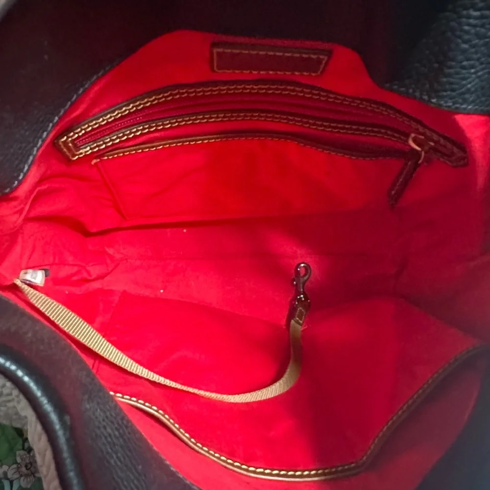 Dooney & Bourke black & brown leather shoulder bag with gold “C” ring/clasp. - Picture 8 of 13